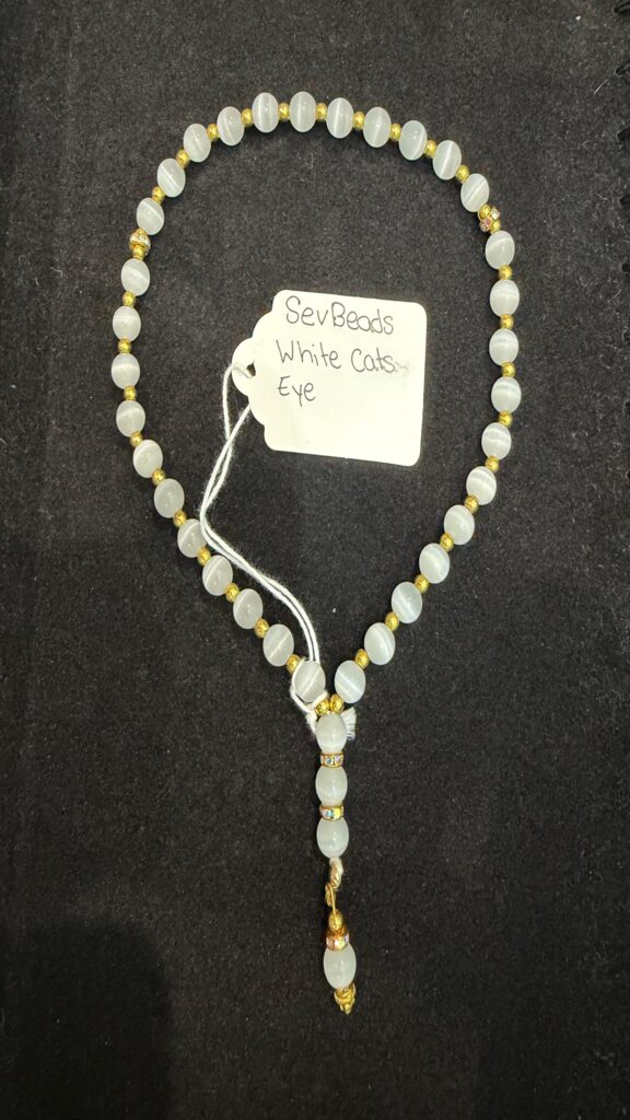 White Cats Eye known as the protective stone, 8 mm